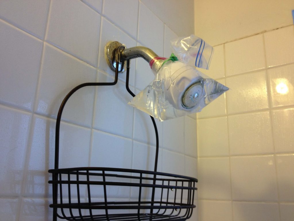 How to Clean Shower Head Holes?