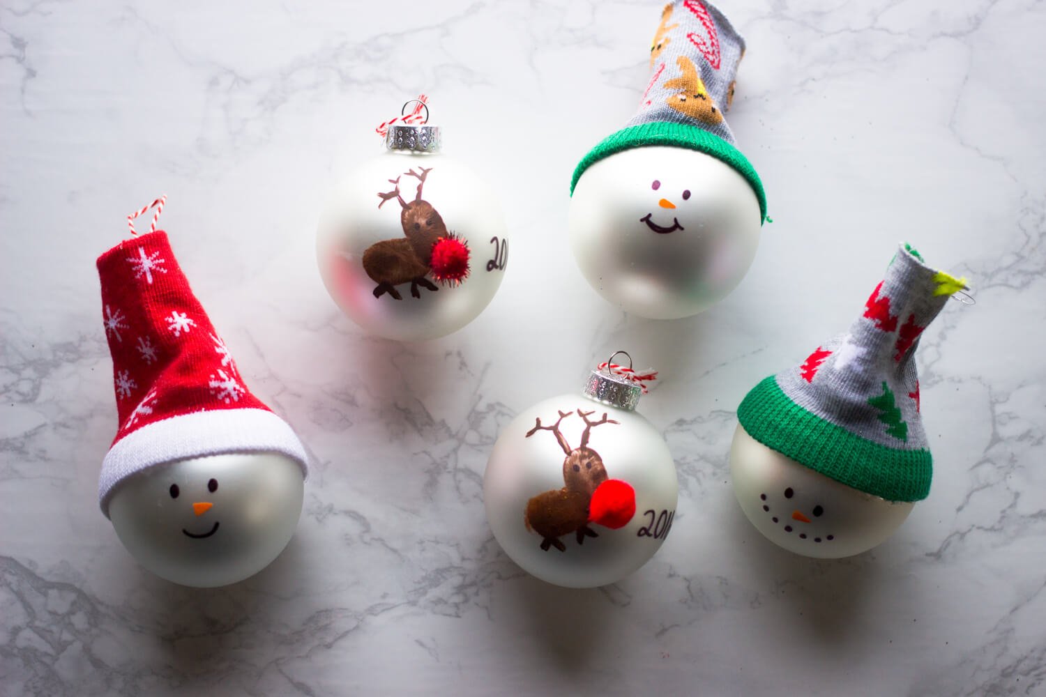 A group of christmas ornaments sitting on top of a table
