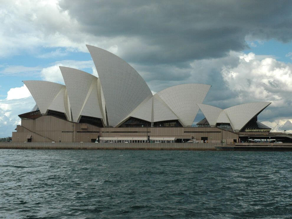 A view of the sydney opera house from the water
