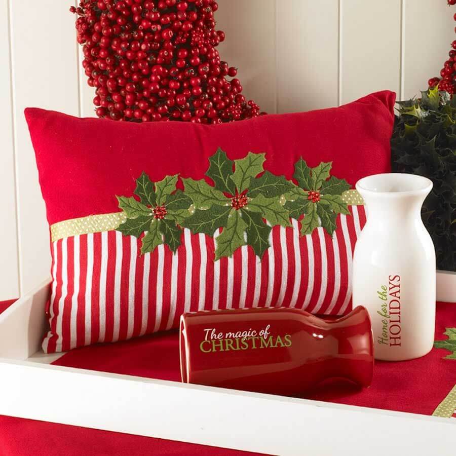 A red and white tray with a red and white pillow and a red and white
