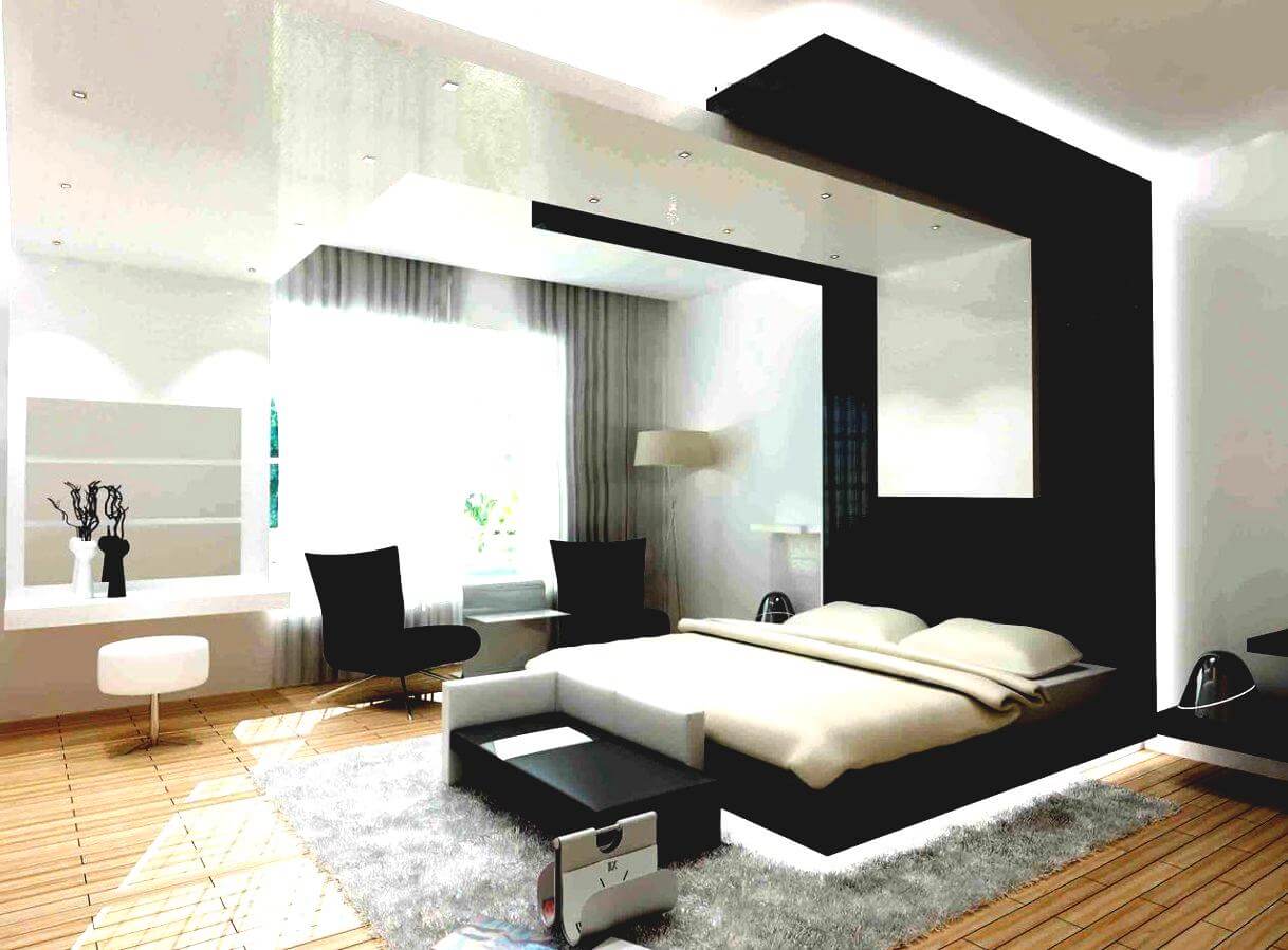 A modern bedroom with a large bed and a large mirror
