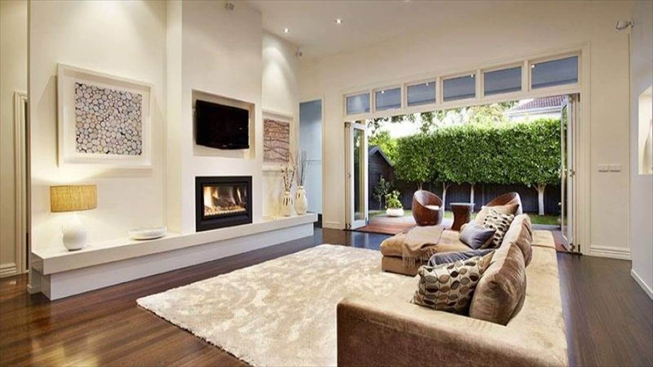 A living room filled with furniture and a fire place
