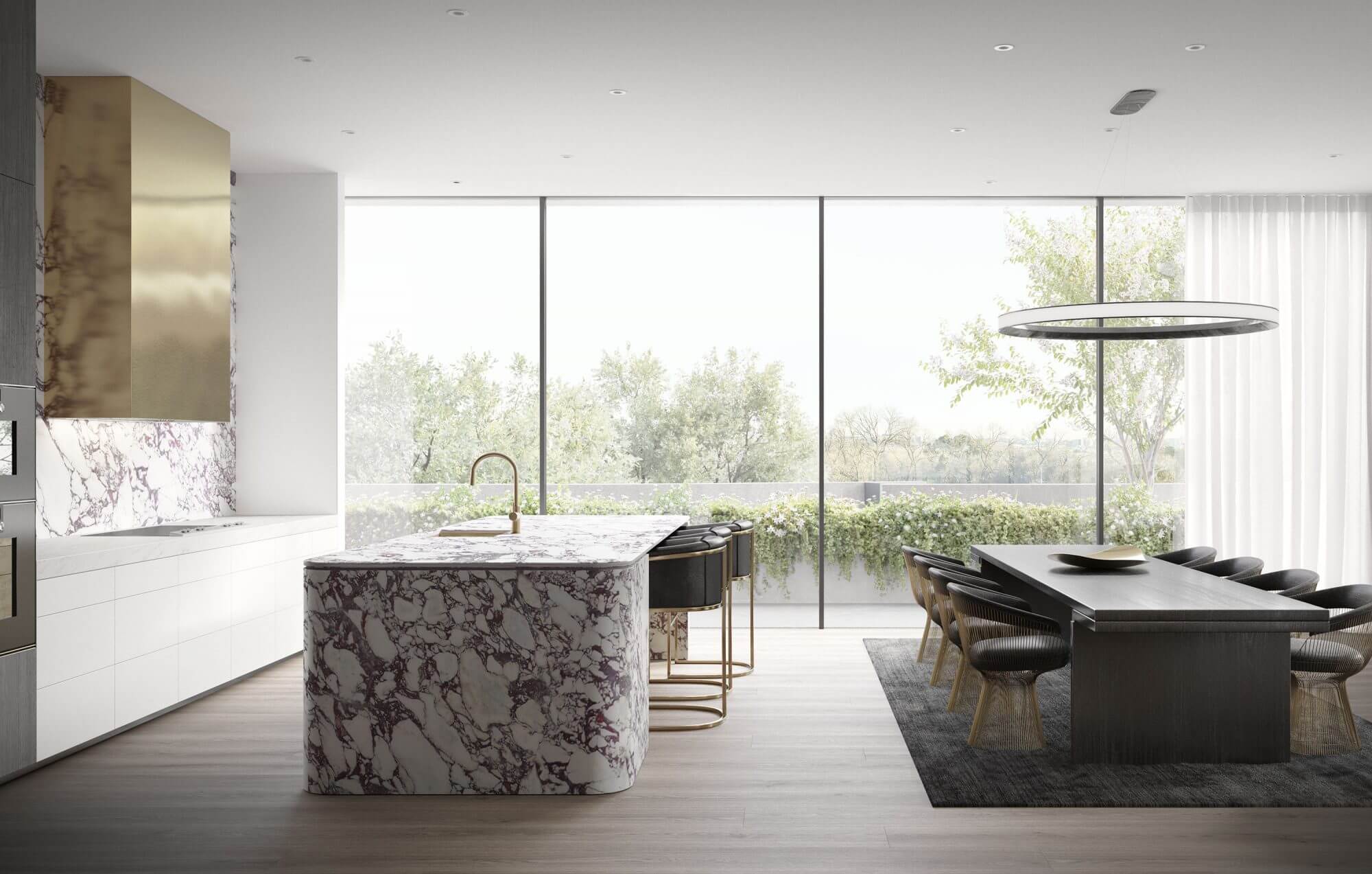 A modern kitchen with marble counter tops and a marble island
