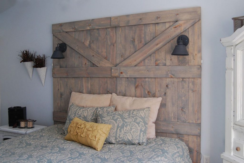 A bed with a wooden headboard made of wood
