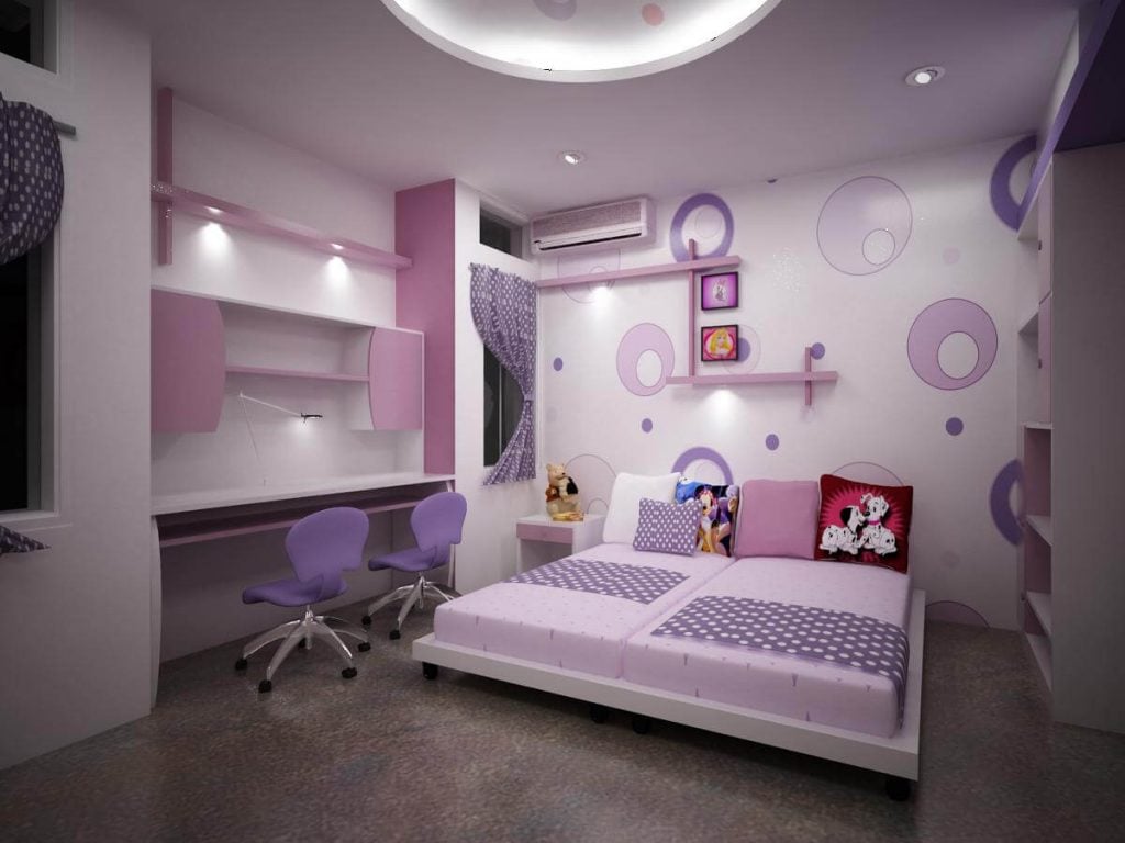 A child's bedroom with a pink and purple theme
