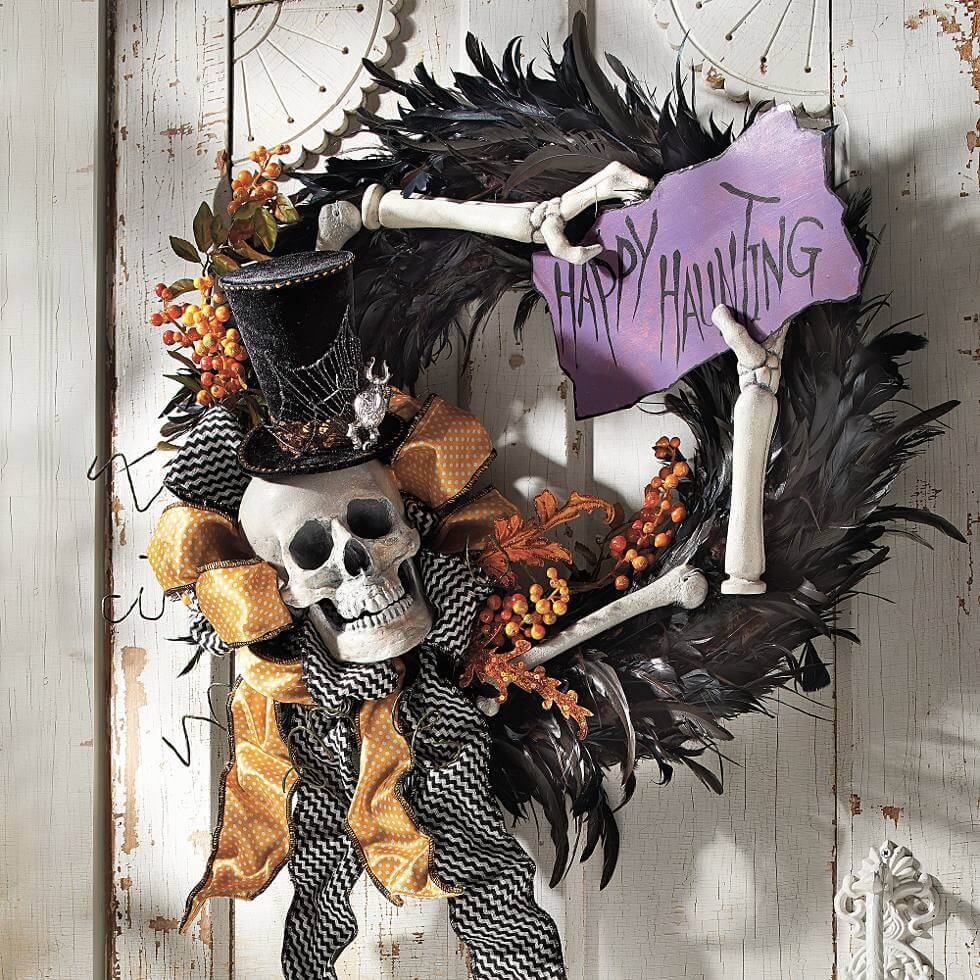 A wreath decorated with a skeleton and a top hat
