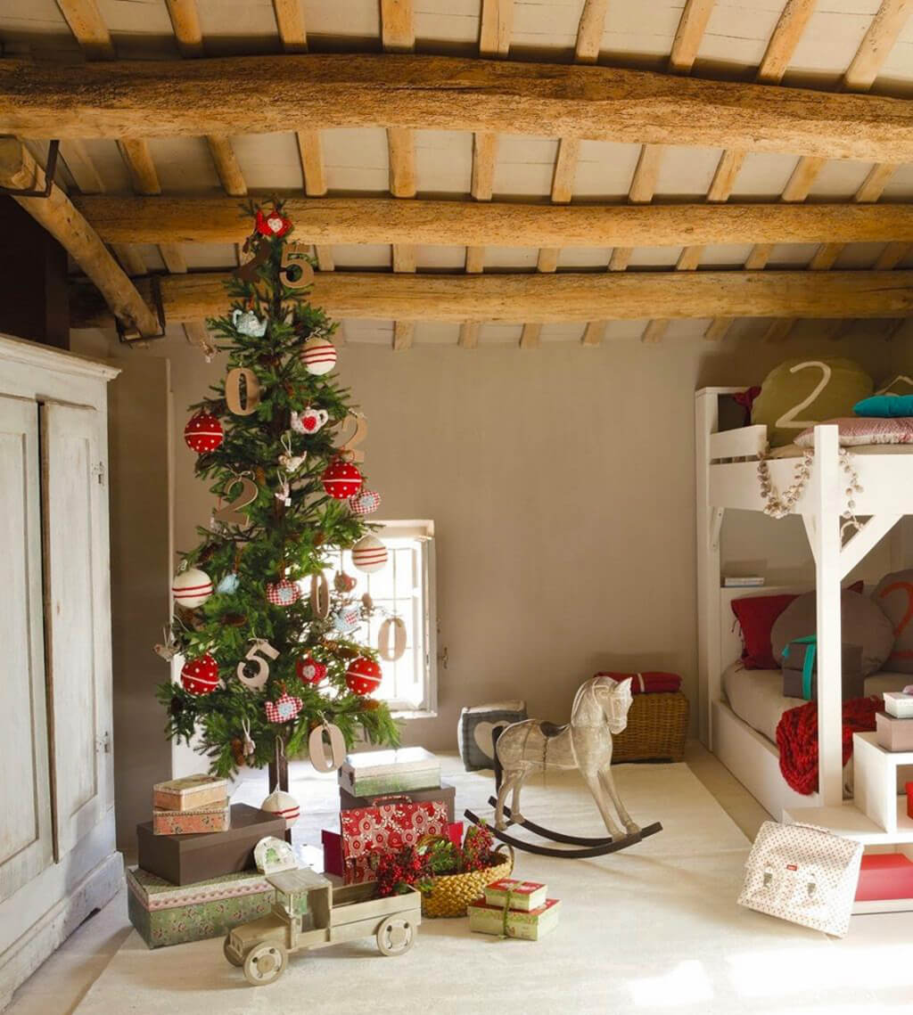 A room with a christmas tree and a rocking horse

