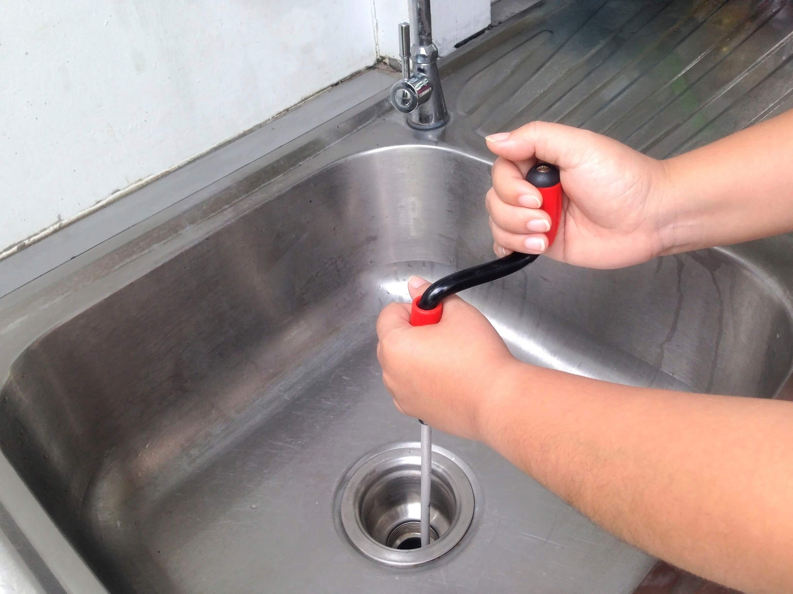 remove kitchen sink clog