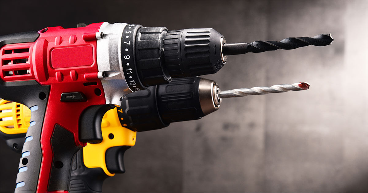 A cordless drill and a screwdriver attached to each other
