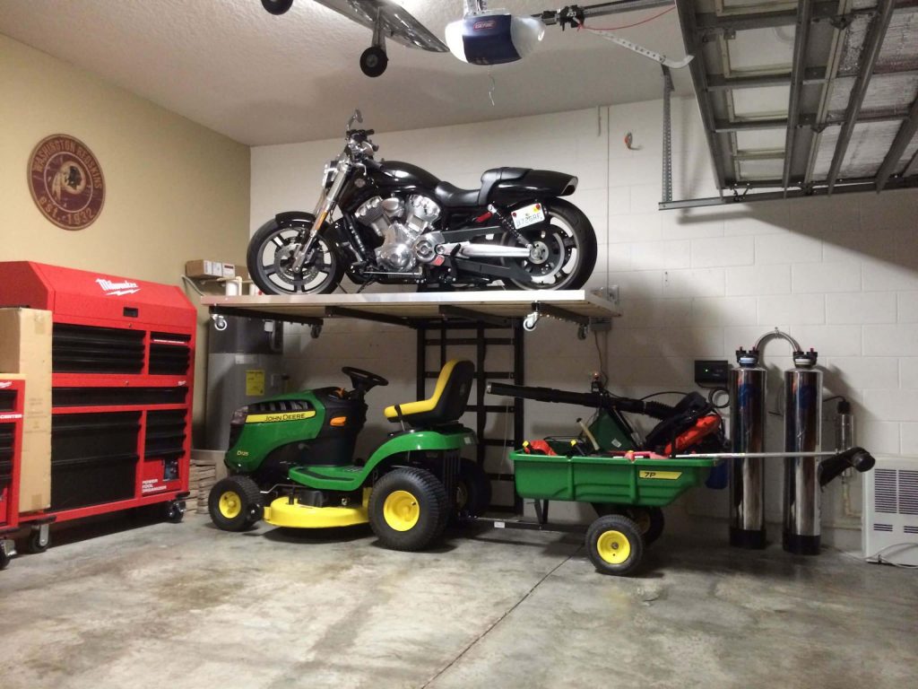 Tractors and Lawnmowers in Garage
