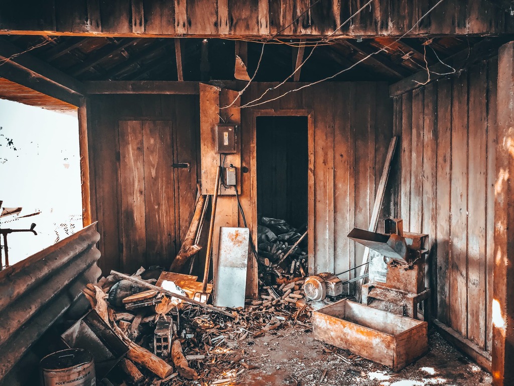 A room that has a bunch of junk in it
