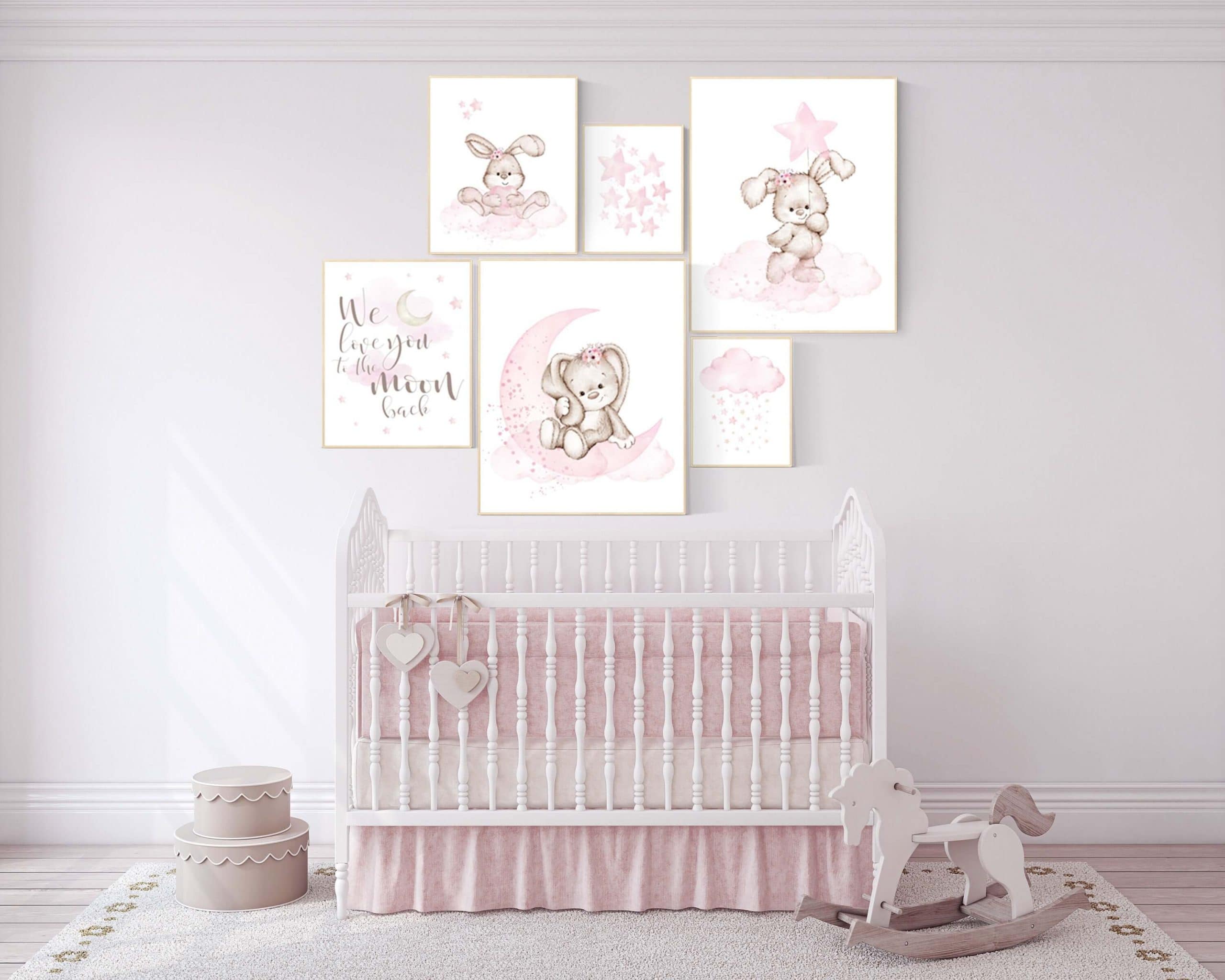 A baby girl's nursery with pink and white decor
