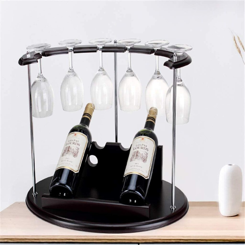 A wall mounted wine rack with three bottles of wine
