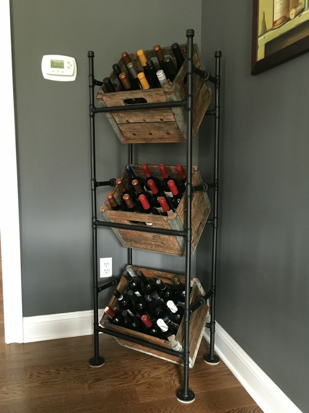 A wine rack with several bottles of wine
