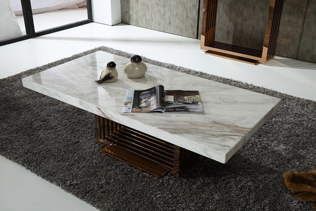 A marble coffee table with a magazine on top
