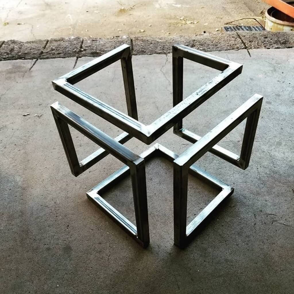 A metal object sitting on top of a sidewalk welding projects ideas