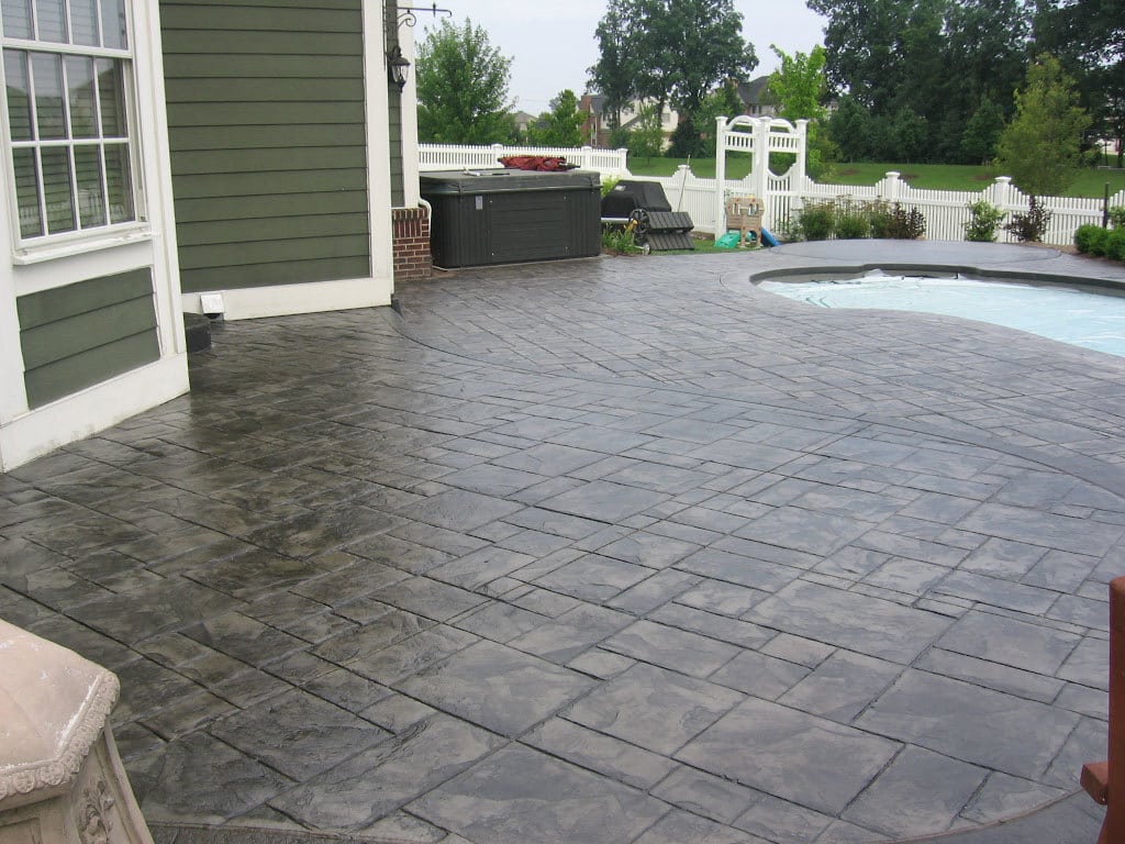 stamped concrete patio with pool
