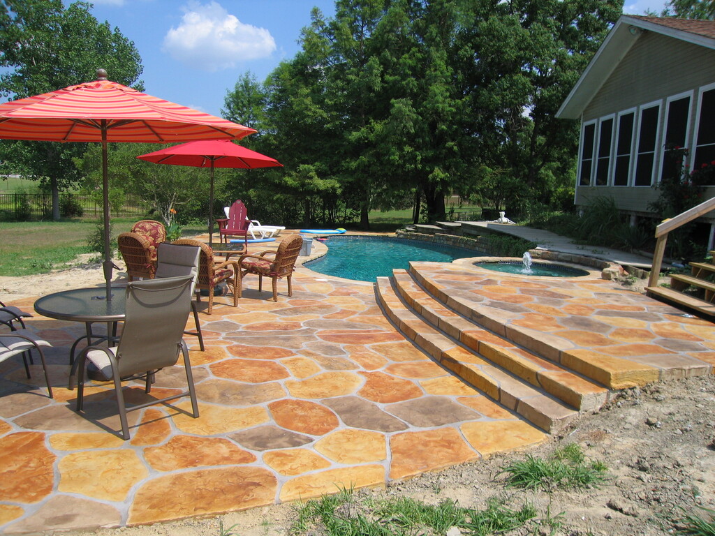 stamped concrete patio with pool deck