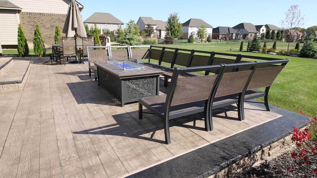 Biondo cement stamped concrete patio with seating arrangement 