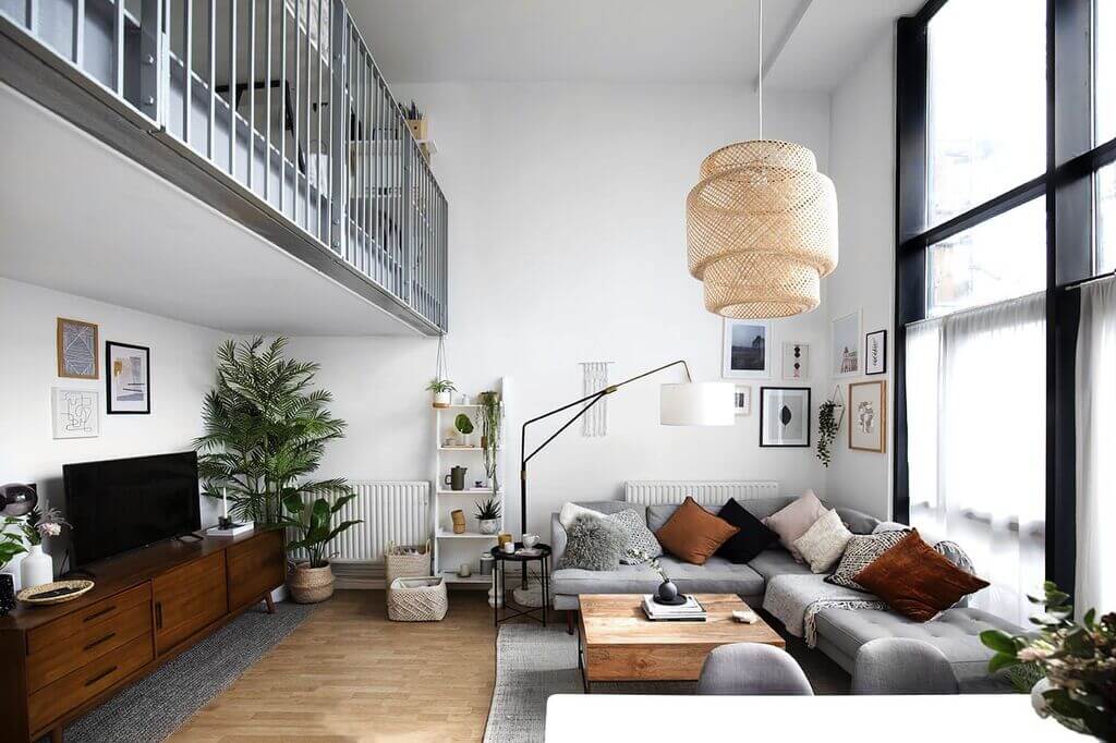 A living room filled with furniture and a flat screen tv
