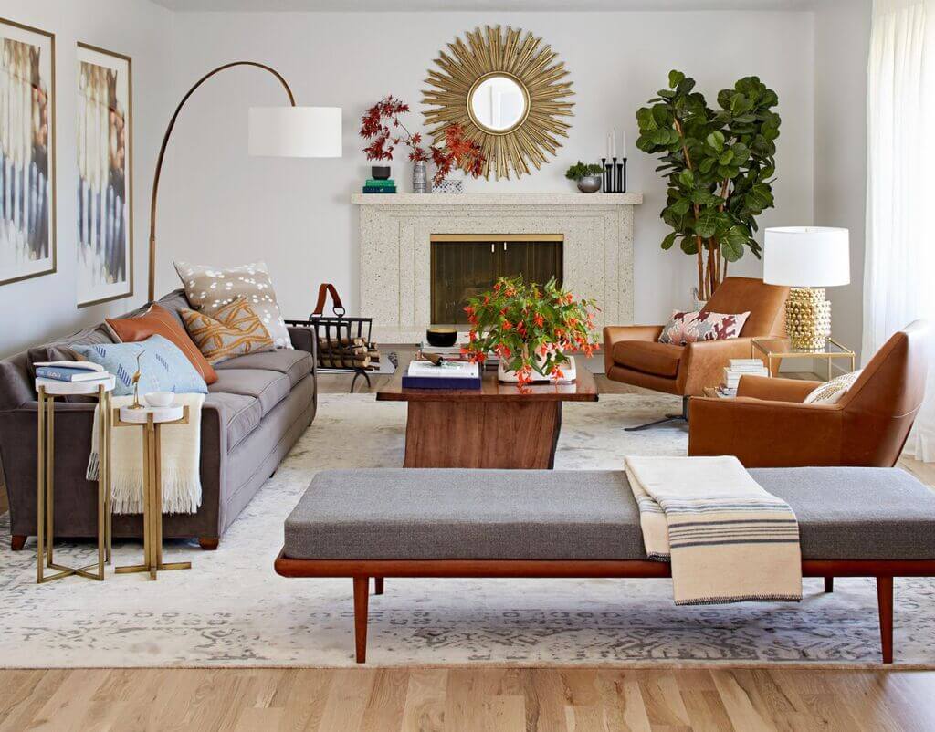 A living room filled with furniture and a fire place
