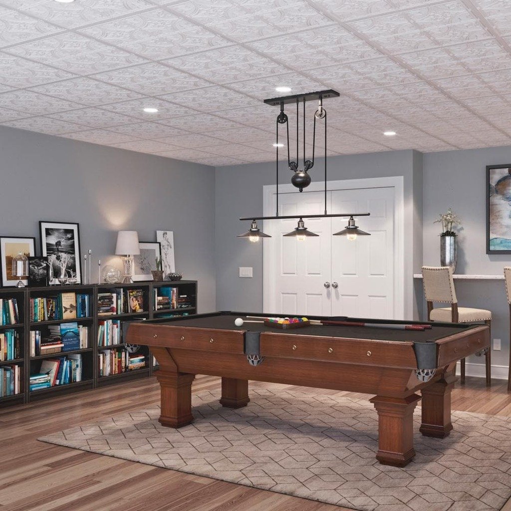 A room with a pool table and a book shelf
