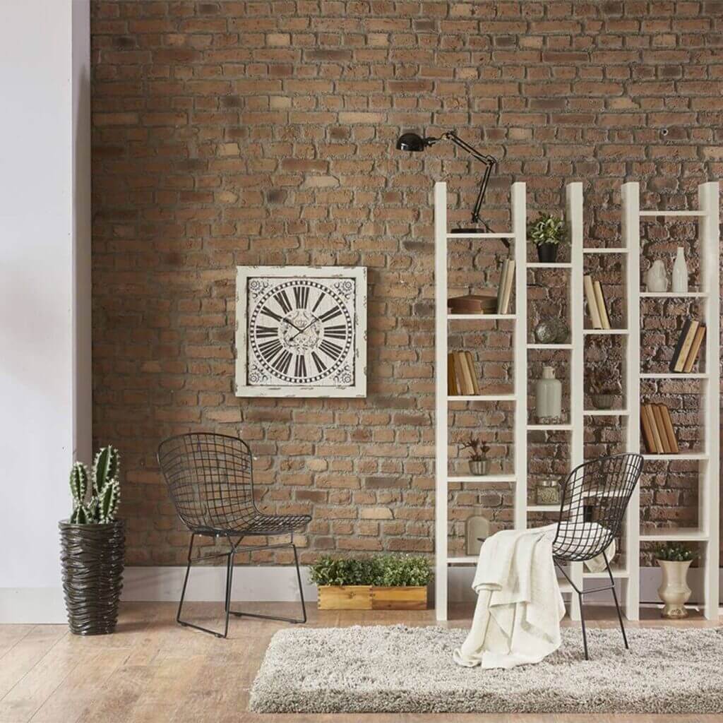 A living room with a brick wall and a rug
