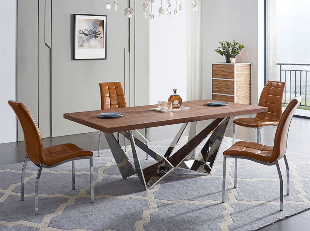 A dining room table with chairs around it
