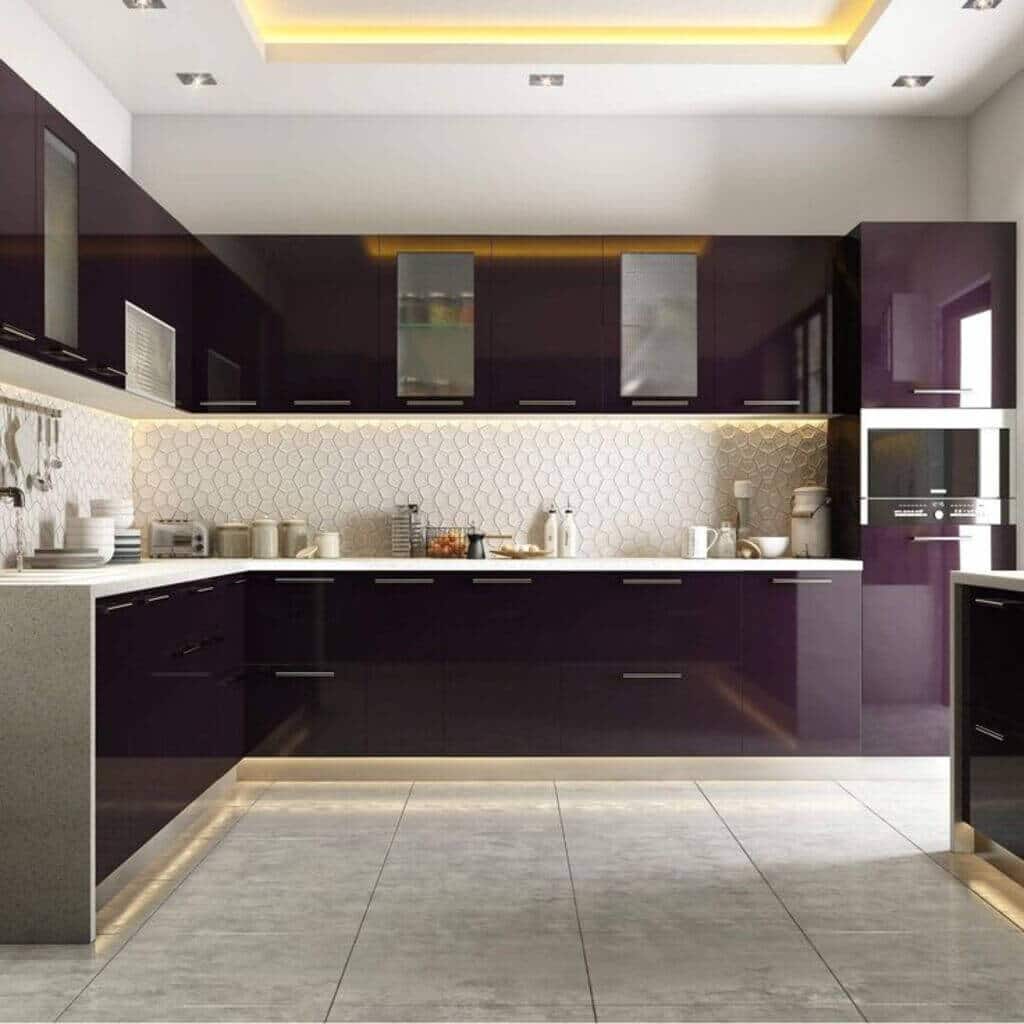 A kitchen with purple cabinets and white counter tops
