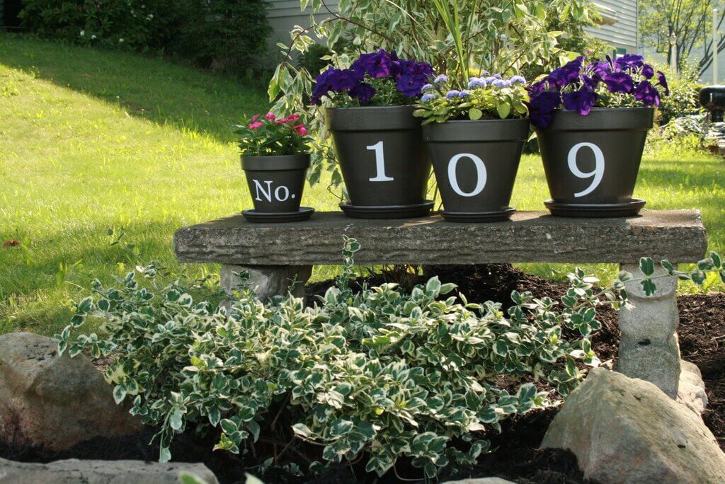 Tired Planters Hosting up House Numbers signs idea