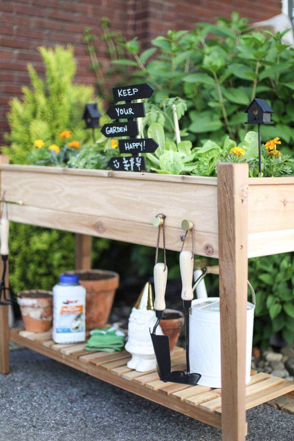 Use Out Tables and Teapots for Inexpensive Raised Garden Bed Ideas 