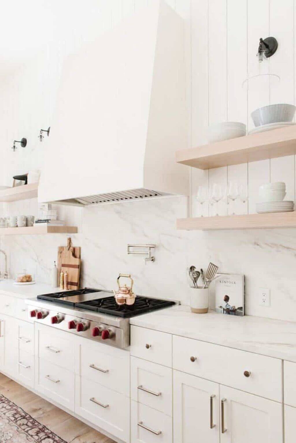 Opulent Marble white cabinet kitchen backsplash idea