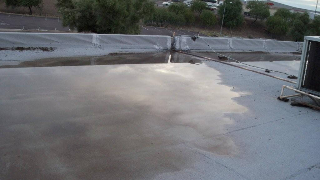 Initial Steps to Fix Ponding Water on the Roof
