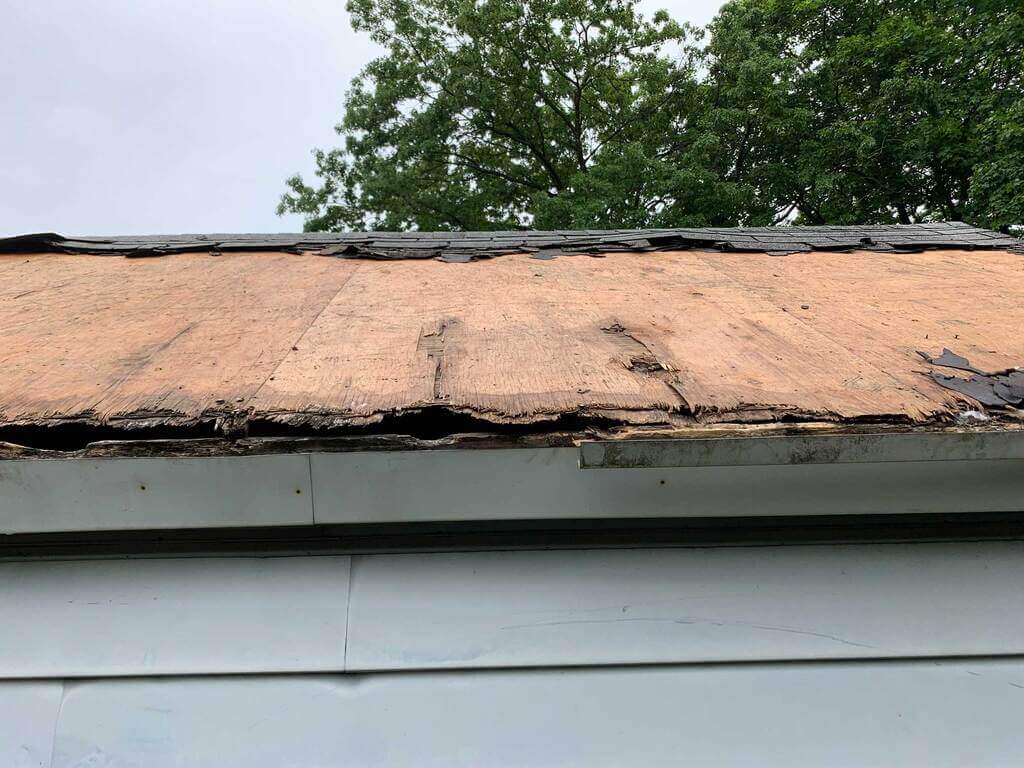The roof of a house that has been gutted
