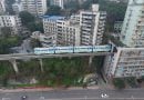 This Train Passes Through Residential Buildings in China! Check now