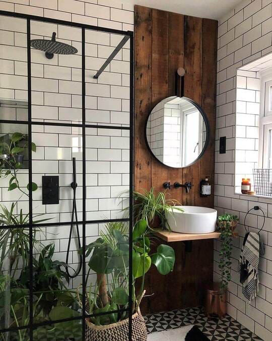 A bathroom with a black and white checkered floor
