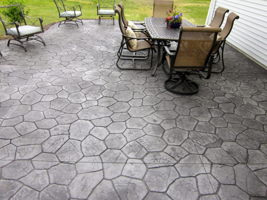 Smoke And Black Stamped Concrete patio