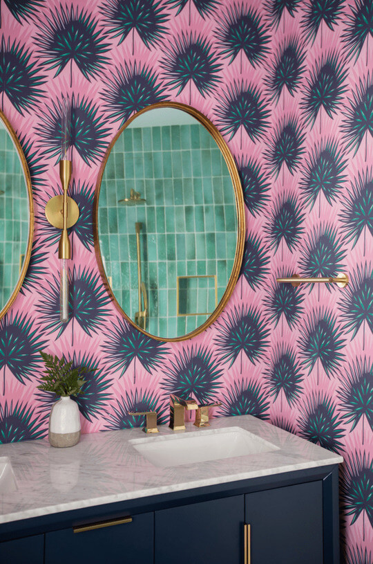 pink wallpaper in bathroom with sink
