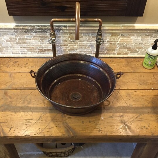 rustic round copper bucket sink