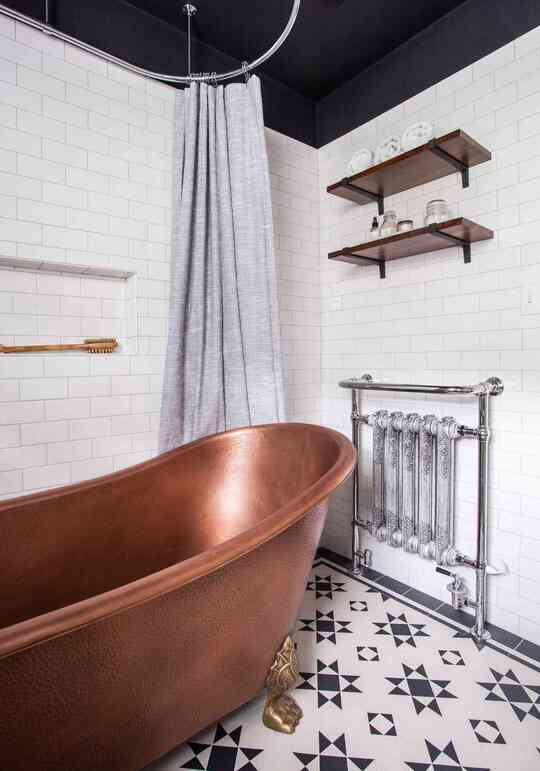 golden bathtub and shower curtain
